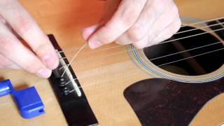 How to Change an Acoustic Guitar String EASY [upl. by Adnorhs]